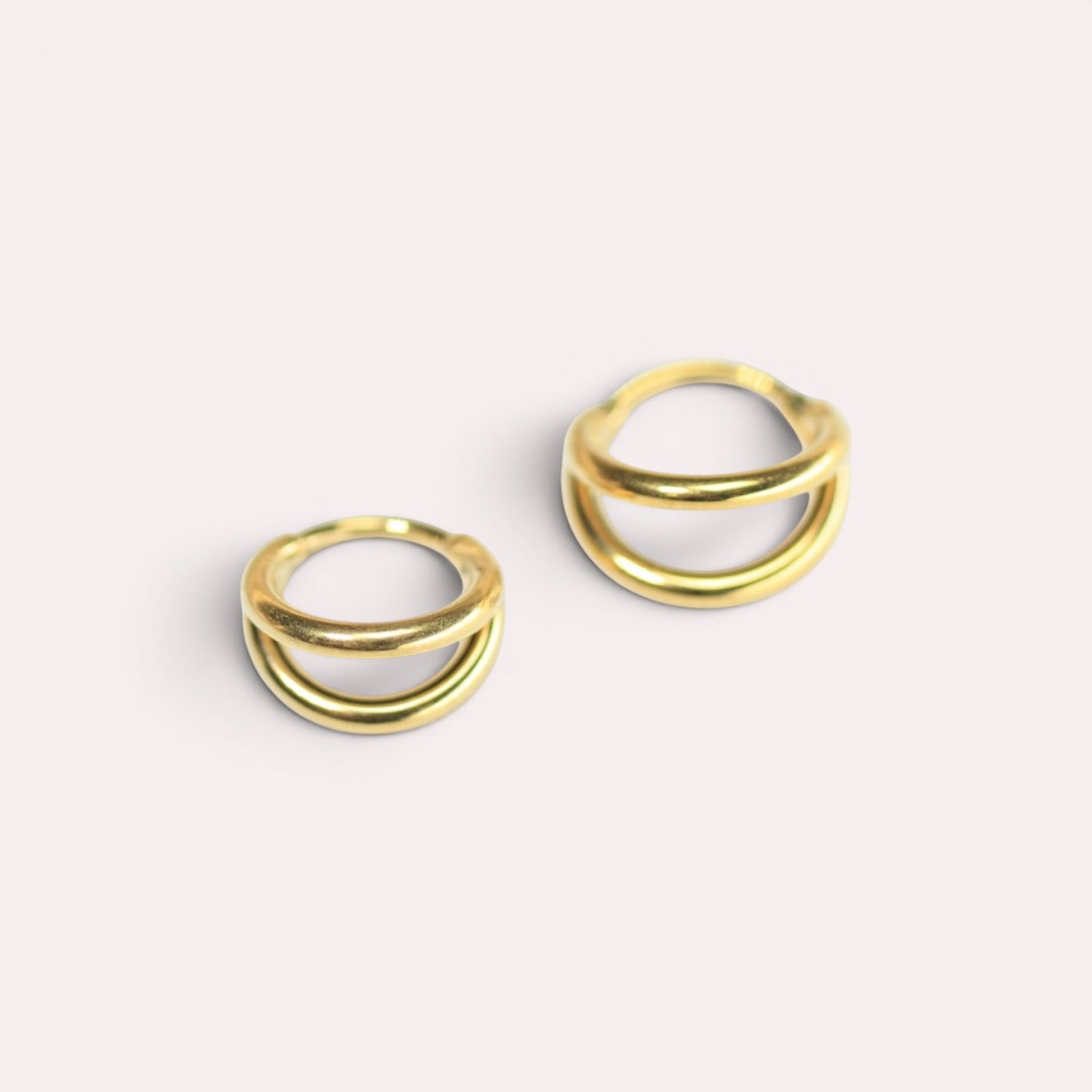 MKBodyJewelry 20g gold double line titanium nose clicker ring with a minimalist snug fit design.
