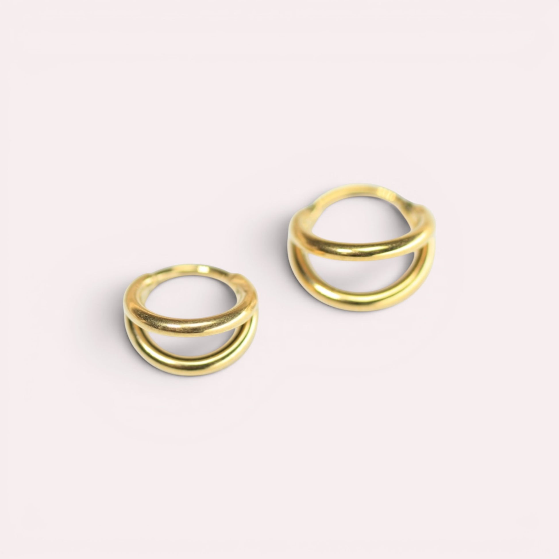 MKBodyJewelry 20g gold double line titanium nose clicker ring with a minimalist snug fit design.