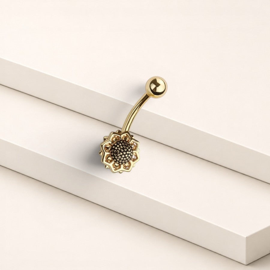 MKBodyJewelry 14G gold floral belly ring made of surgical steel with a dainty flower design for navel piercings.