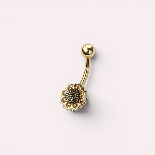 MKBodyJewelry 14G gold floral belly ring made of surgical steel with a dainty flower design for navel piercings.