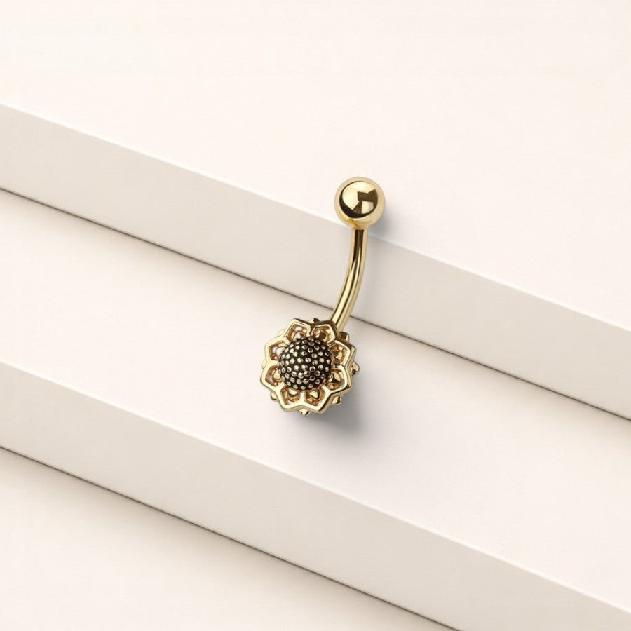 MKBodyJewelry 14G gold floral belly ring made of surgical steel with a dainty non-dangle flower design.