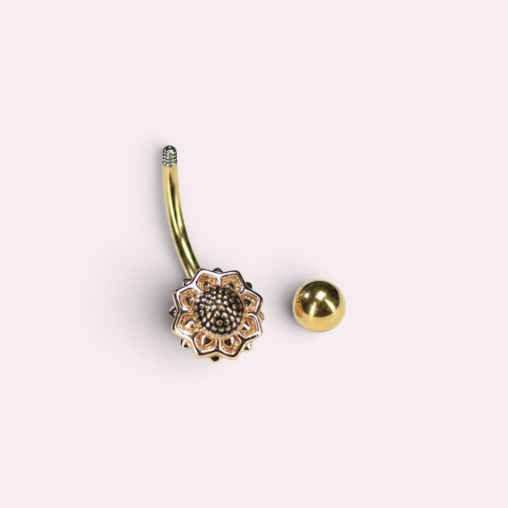 MKBodyJewelry 14G gold floral belly ring made of hypoallergenic surgical steel with a dainty flower design