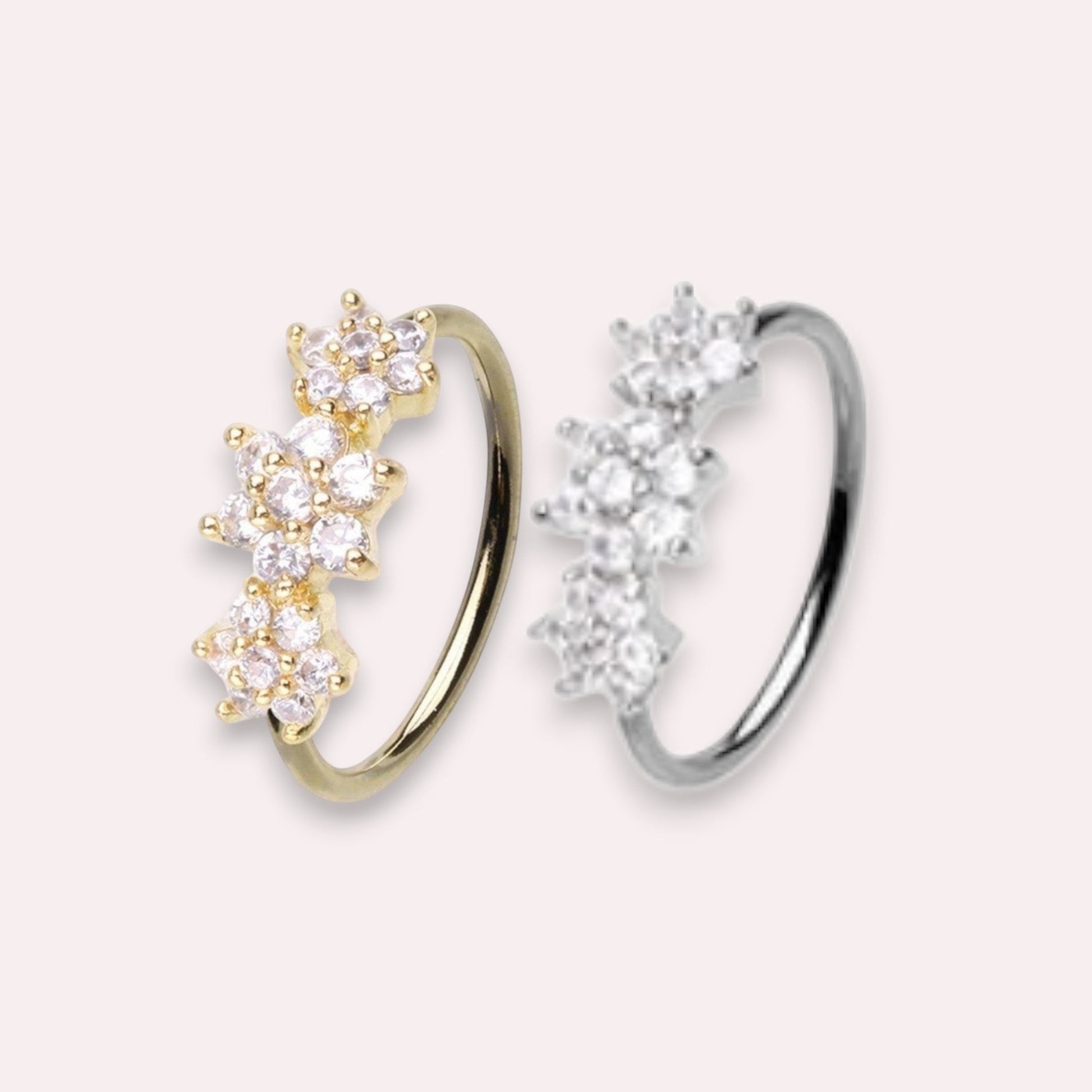 MKBodyJewelry gold surgical steel nose hoop with three sparkling CZ floral accents, suitable for nose or cartilage.