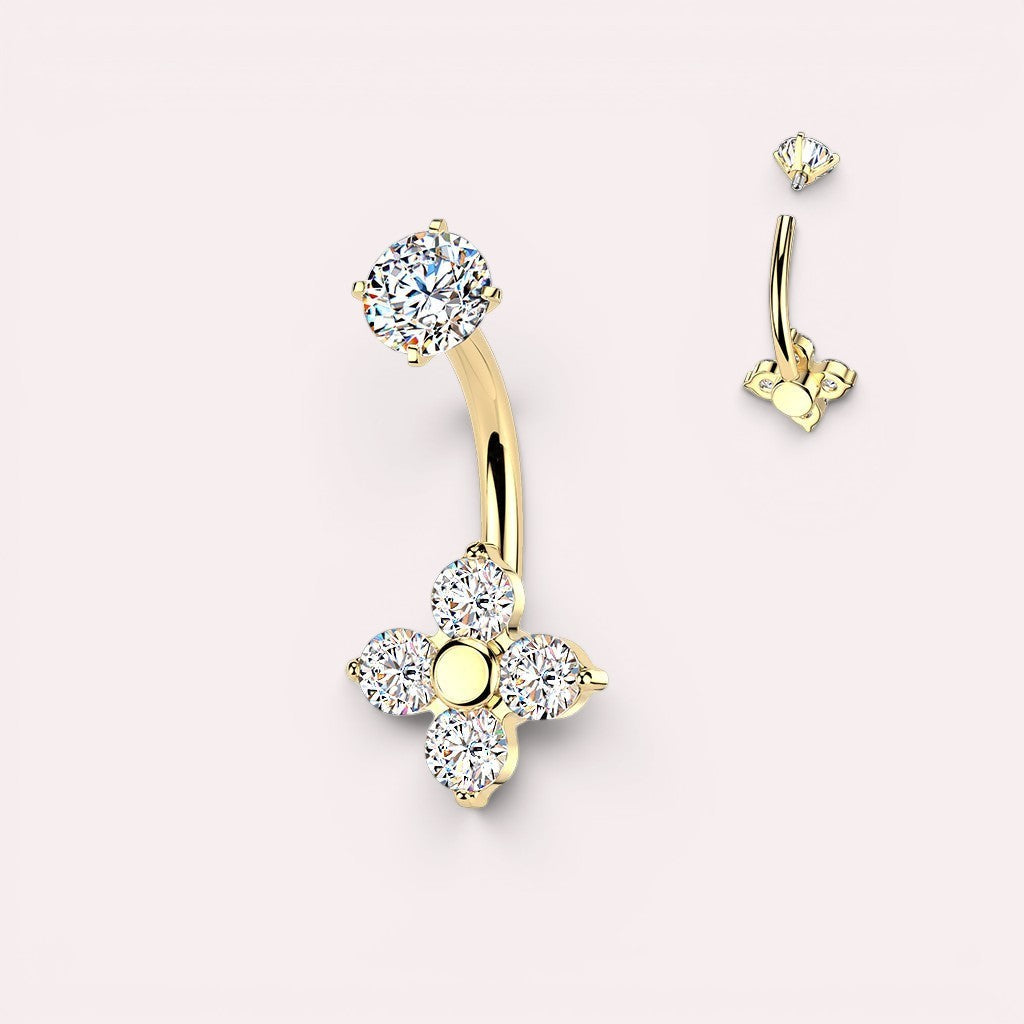 MKBodyJewelry gold belly button ring with four petal flower design adorned with cubic zirconia stones.