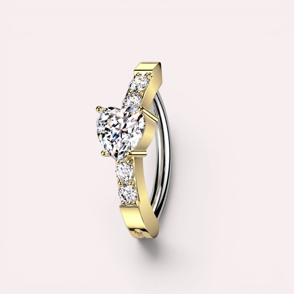 MKBodyJewelry gold heart belly button clicker ring with CZ stones, crafted from surgical steel in a 14g hinged design.