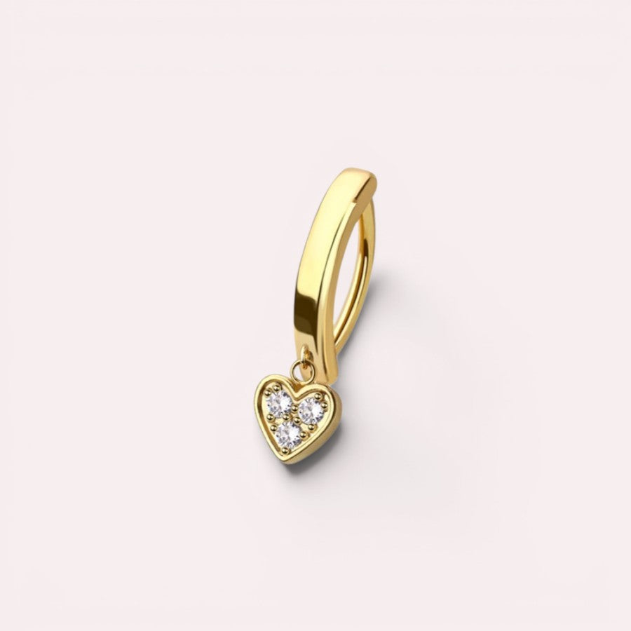 MKBodyJewelry gold dangling belly button ring with a heart charm featuring three sparkling crystals on a clicker hoop.