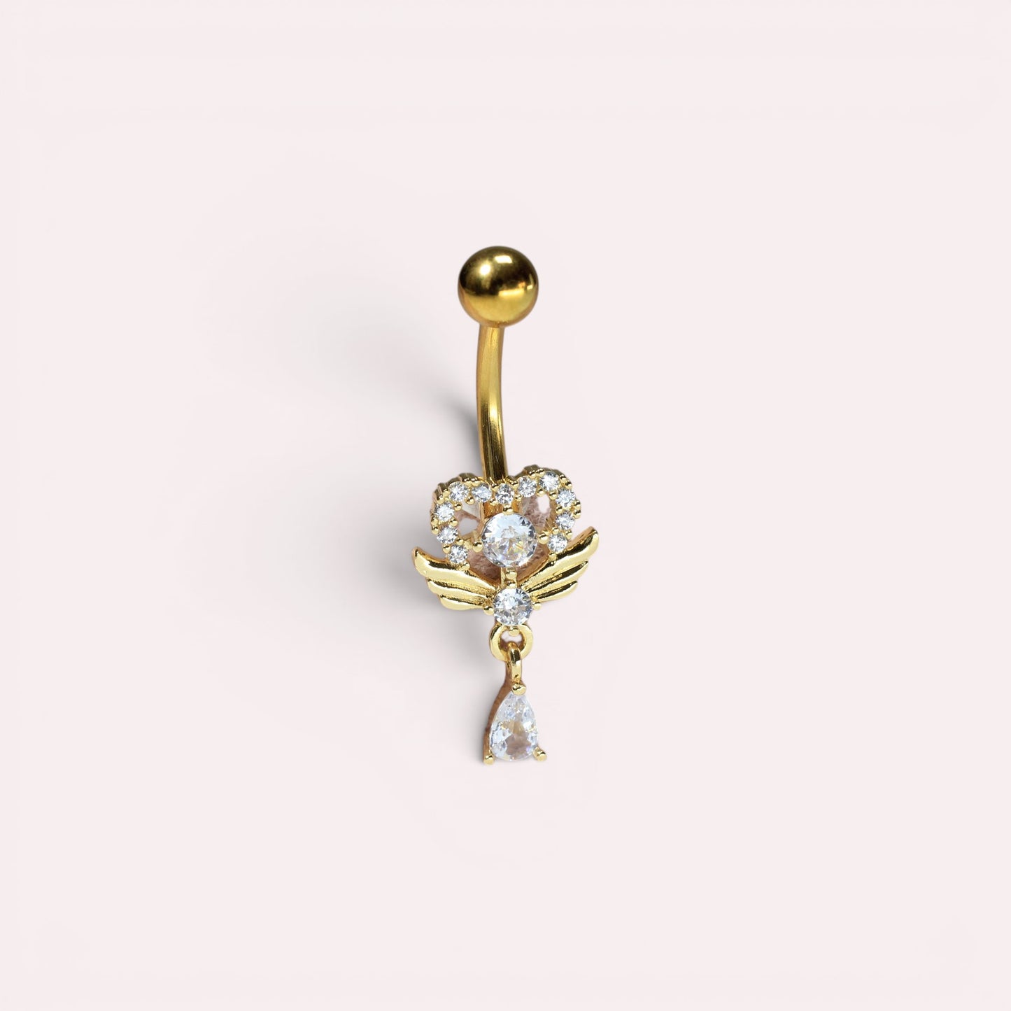 MKBodyJewelry gold heart belly button ring with angel wings, cubic zirconia stones, and a dangling teardrop charm.