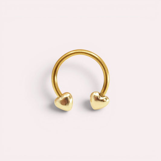 MKBodyJewelry 16G gold surgical steel horseshoe septum ring featuring minimalist heart-shaped ends.