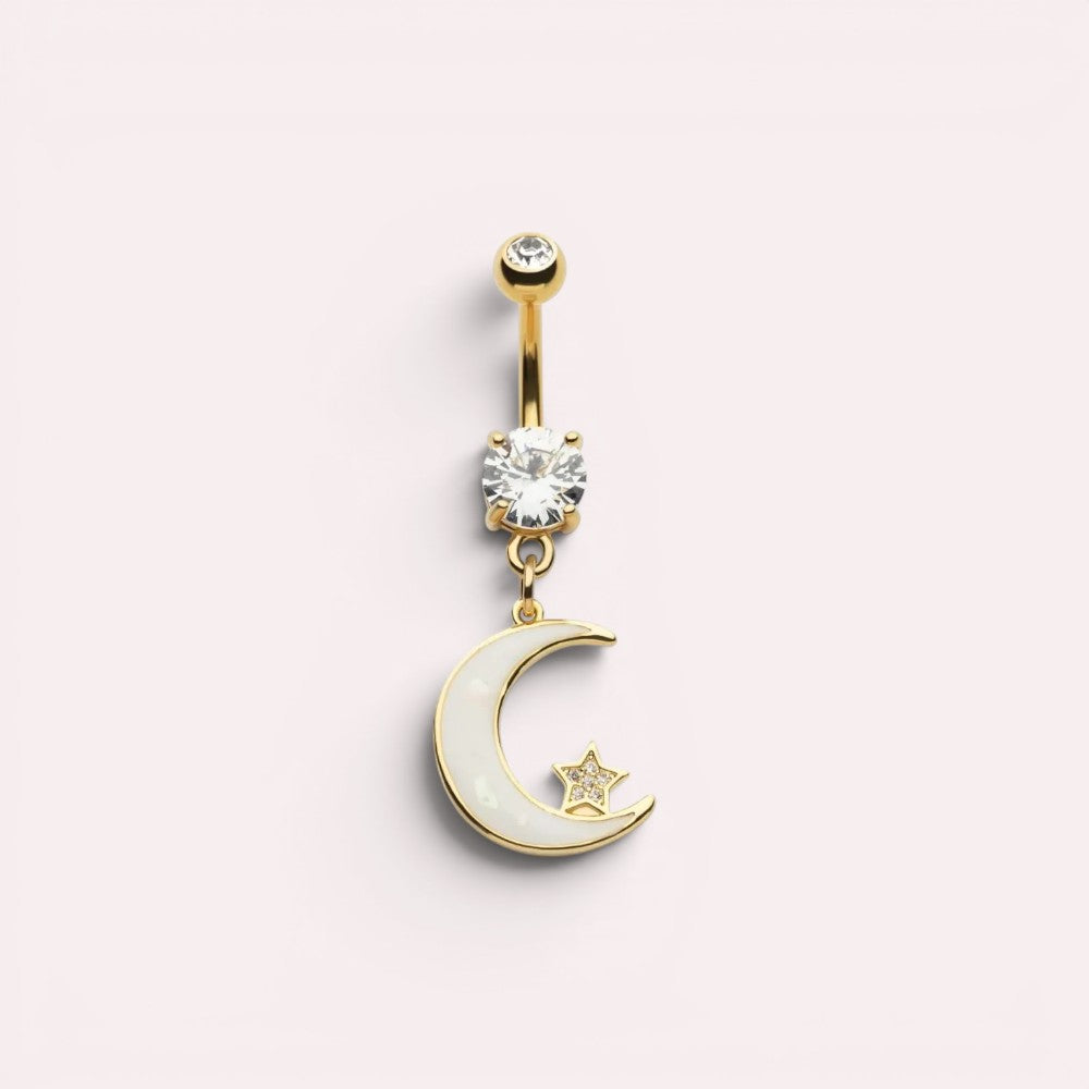 MKBodyJewelry gold stainless steel dangling moon belly button ring with a white crescent and small star charm.