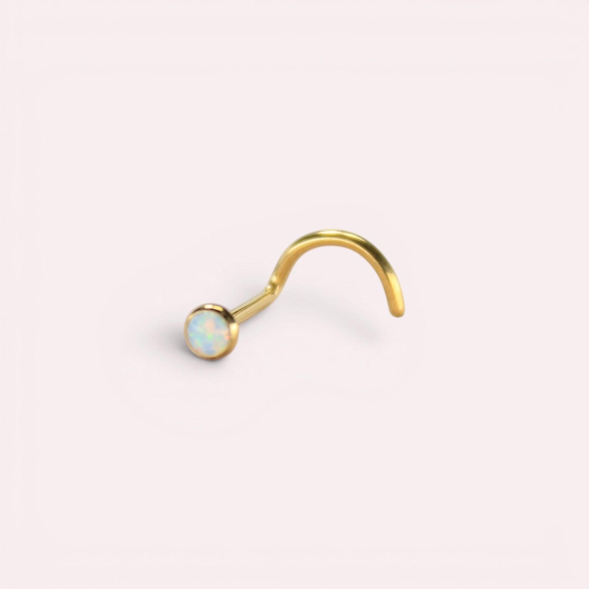 MKBodyJewelry gold titanium nose screw with a 2.5mm round opal gem, featuring a secure corkscrew S-shape design.