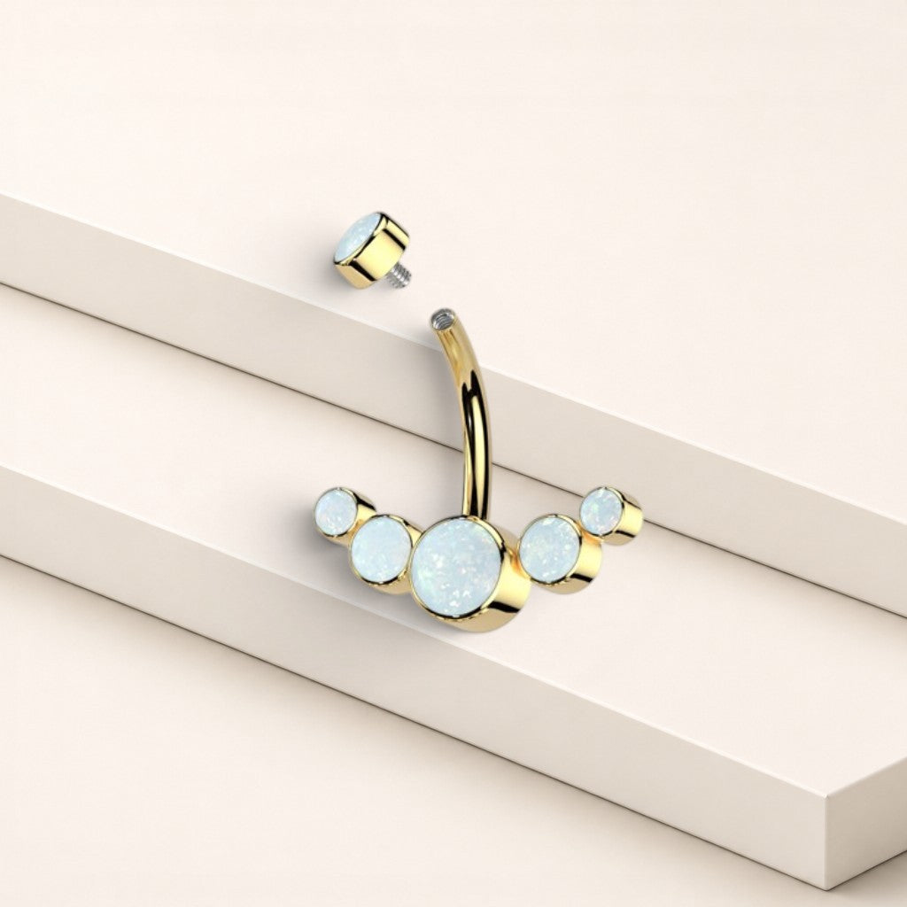 MKBodyJewelry 14G gold titanium floating navel ring with five white opal stones in a minimalist curved design.