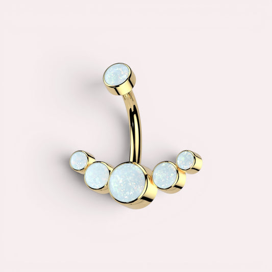MKBodyJewelry 14G gold titanium floating navel ring featuring a curved barbell with five white opal stones.