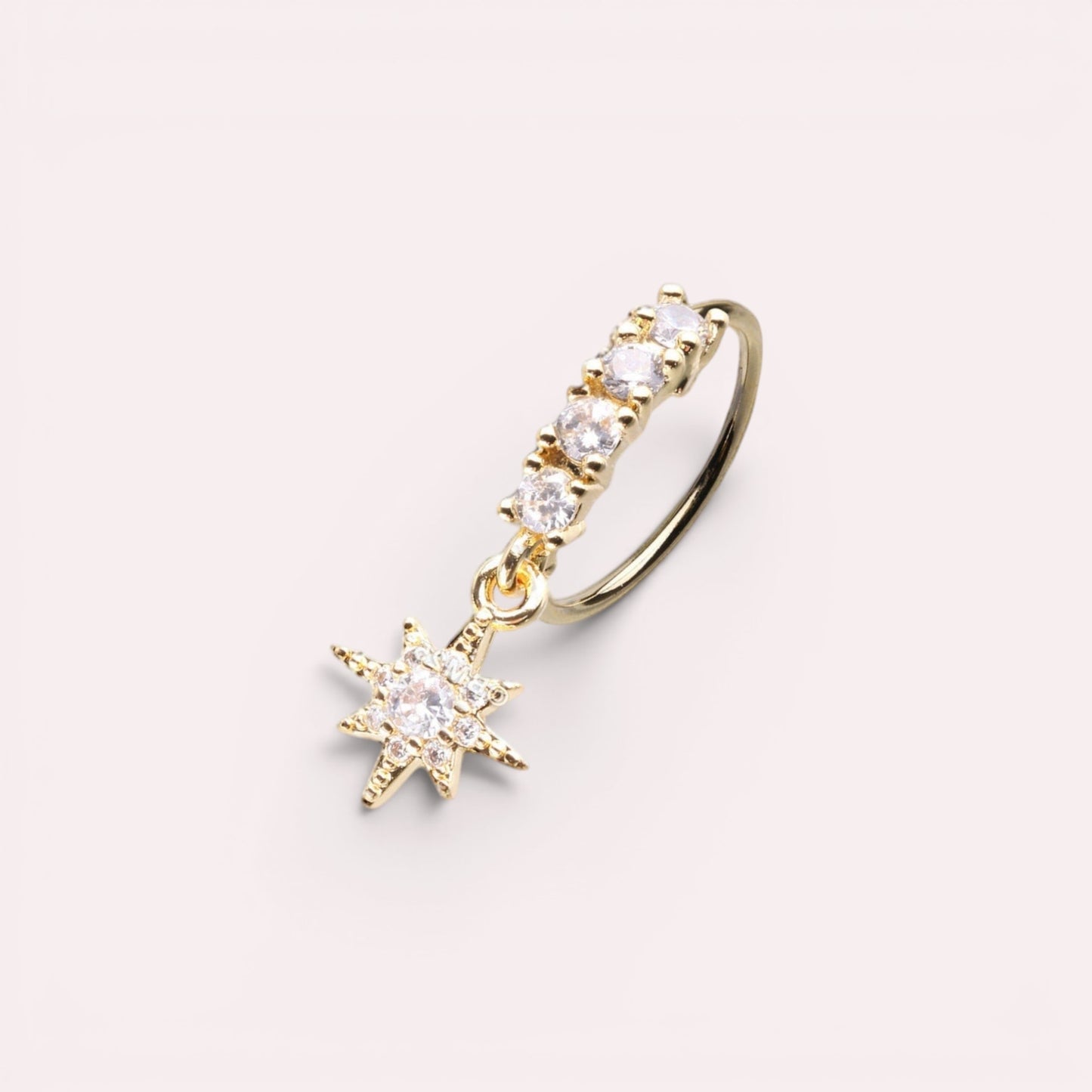 MKBodyJewelry 20g gold surgical steel nose hoop with CZ crystals and a dangling star charm for nose or cartilage.