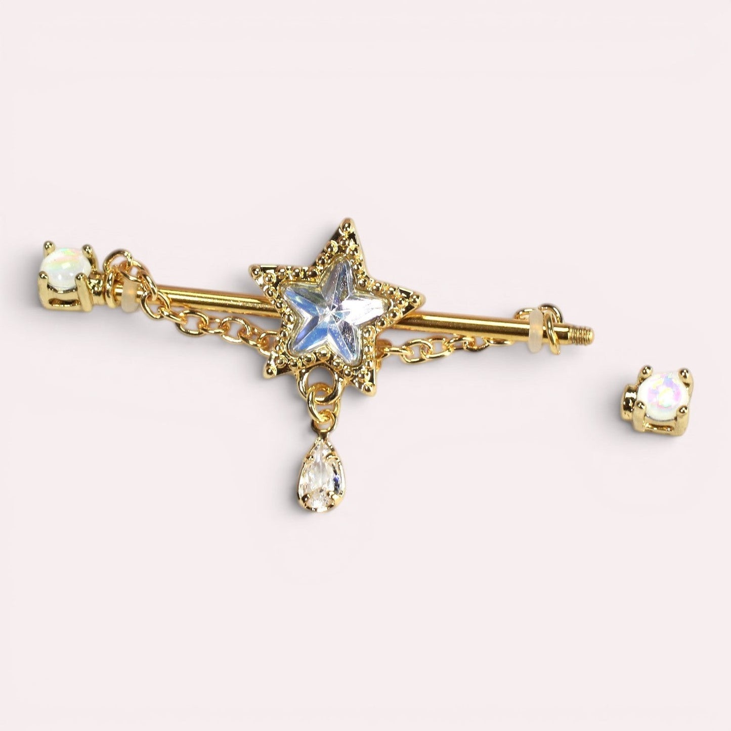 MKBodyJewelry 14G gold industrial barbell with dangling star and teardrop charm, surgical steel, 35mm length.
