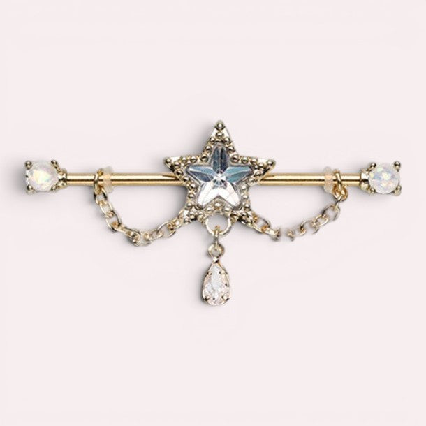 MKBodyJewelry 14G gold industrial barbell with dangling chain, star charm, and teardrop gem. Surgical steel.