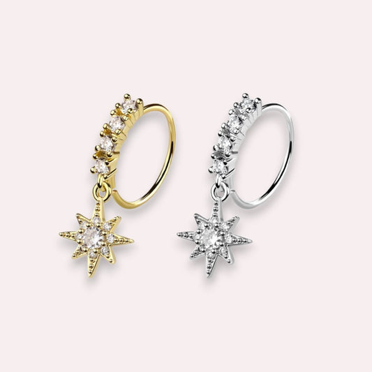 MKBodyJewelry 20g gold surgical steel nose hoop with a dangling CZ star charm and sparkling crystal accents.