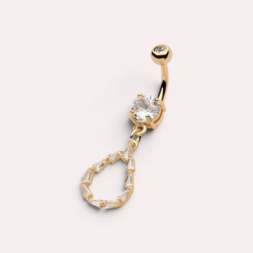 MKBodyJewelry 14G gold dangling belly button ring featuring a teardrop charm with baguette CZ stones and surgical steel.