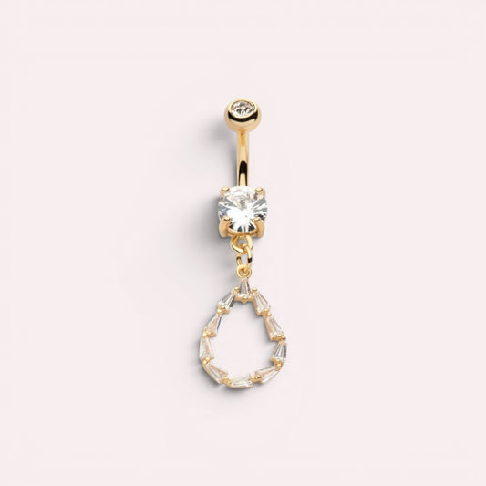 MKBodyJewelry 14G gold surgical steel belly button ring with a dangling teardrop baguette CZ stone charm.