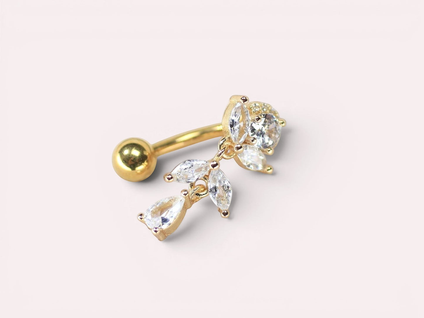 MKBodyJewelry gold titanium inverted floral belly button ring with clear CZ stones and a dangling teardrop.