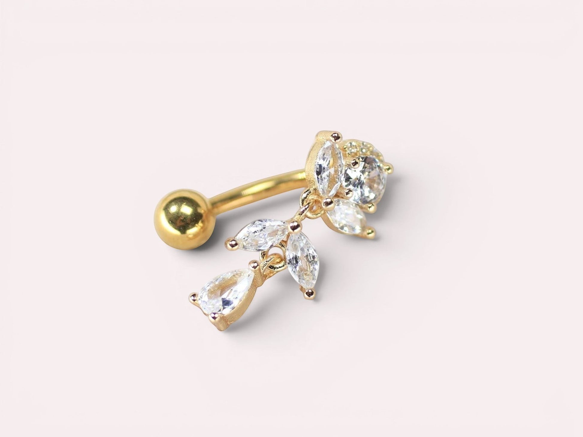 MKBodyJewelry gold titanium inverted floral belly button ring with clear CZ stones and a dangling teardrop.