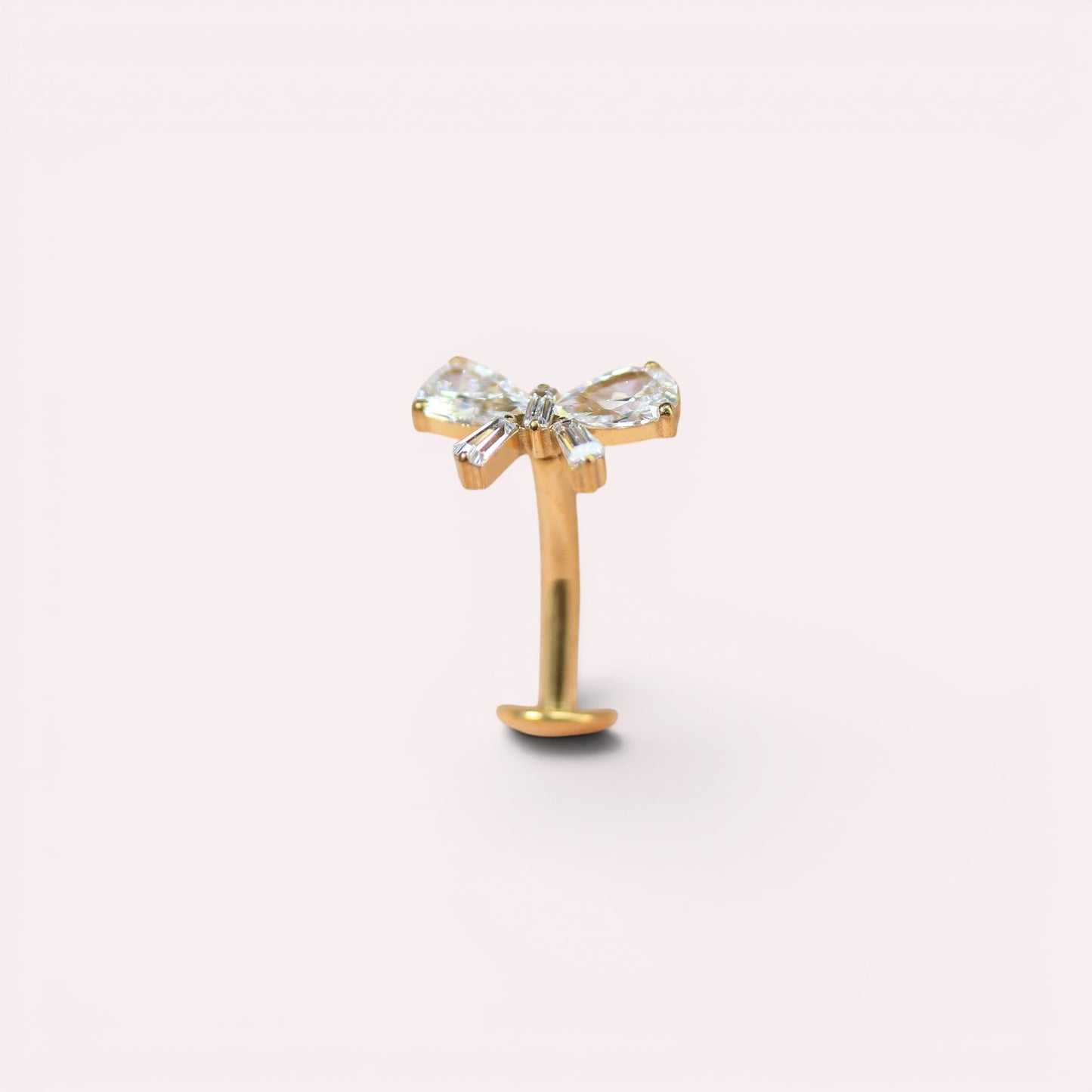 MKBodyJewelry gold titanium threadless bow belly ring with clear crystals. 14G, 10mm barbell.