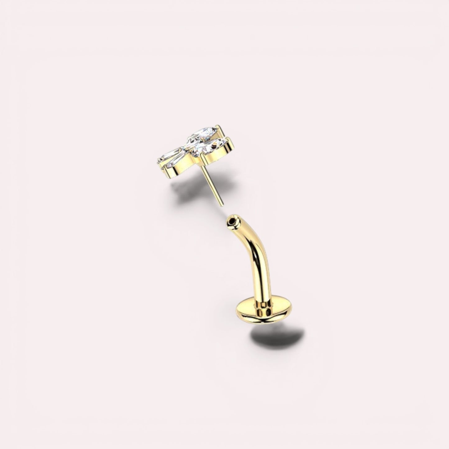 MKBodyJewelry gold titanium threadless bow belly ring with clear crystals. 14G, 10mm barbell.