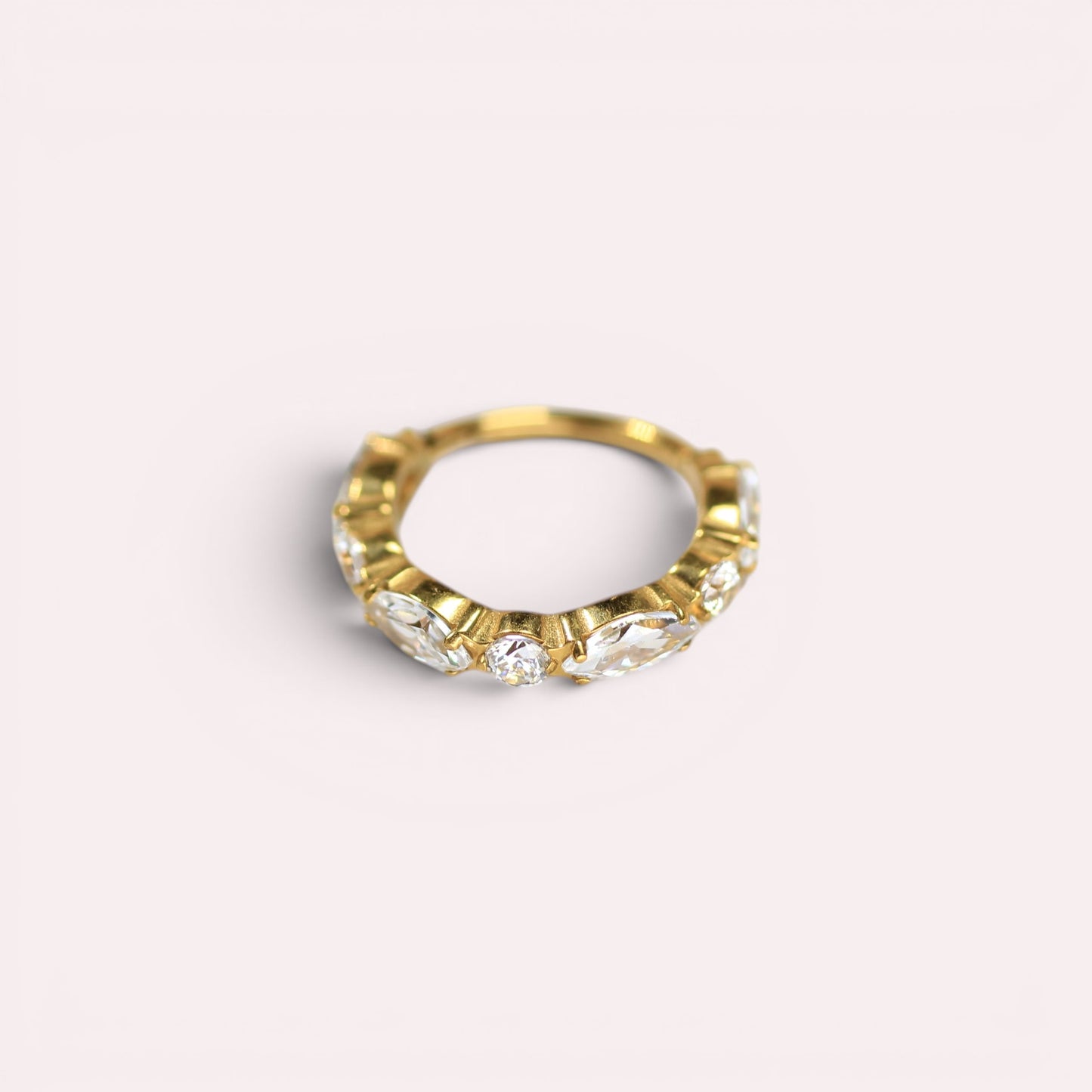 MKBodyJewelry gold titanium hinged nose clicker ring featuring sparkling CZ gems for a minimalist snug fit