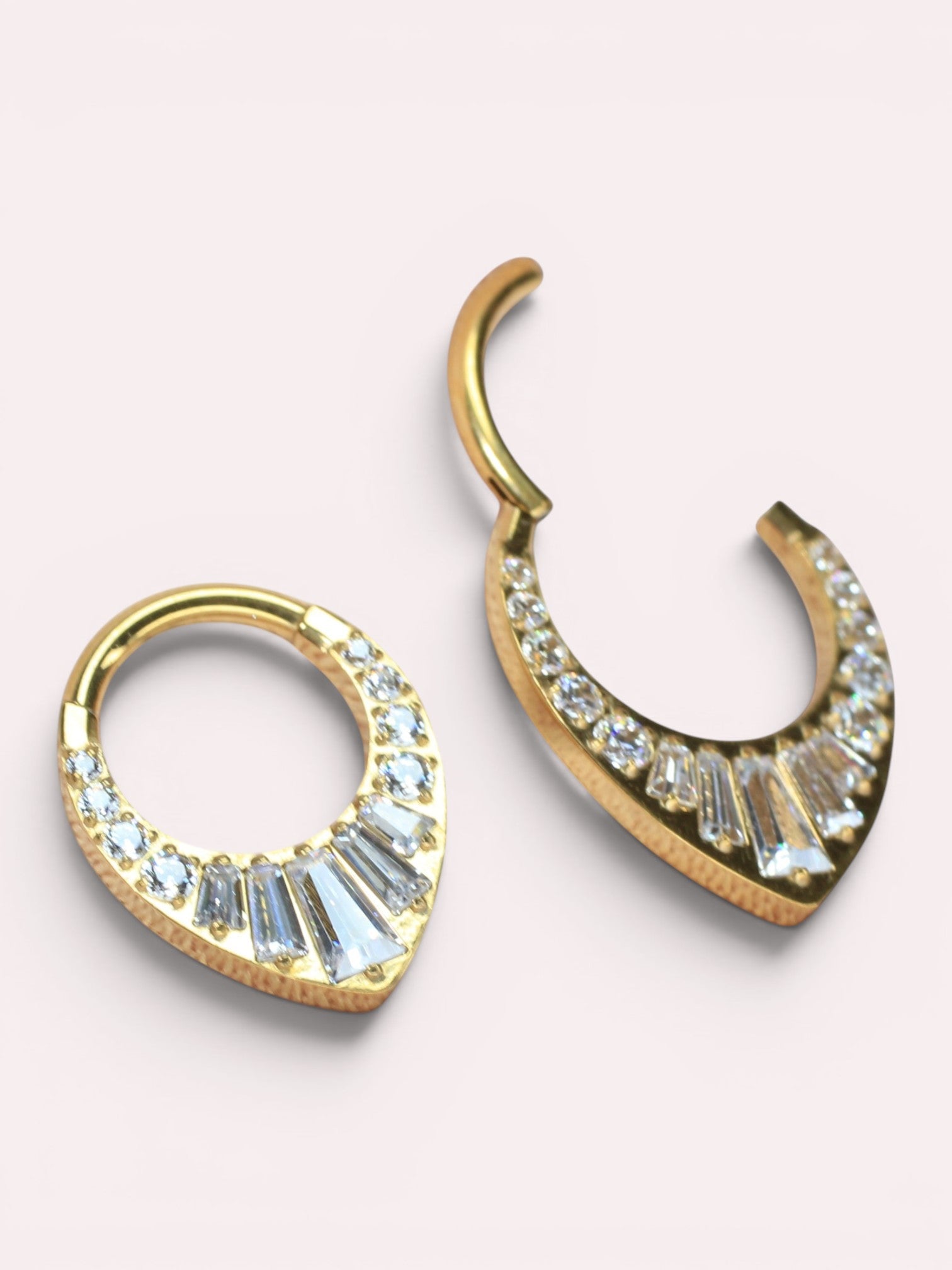 MKBodyJewelry 16g gold titanium septum clicker hoop with V-shaped clear CZ gems. Body jewelry.