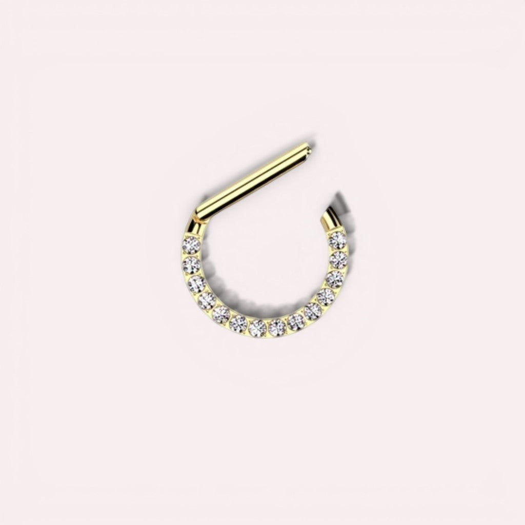 MKBodyJewelry 16G gold titanium septum clicker ring featuring a dainty line of sparkling gems for daith or nose piercing
