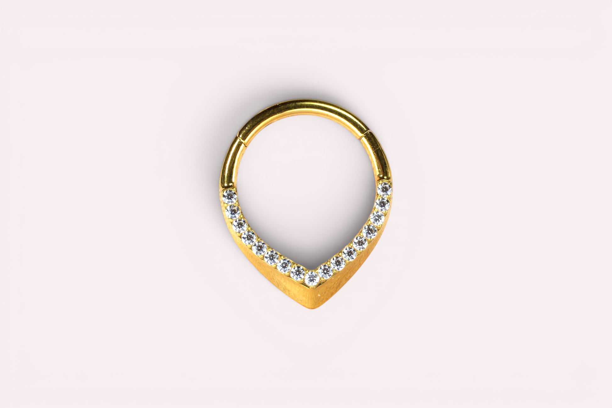 MKBodyJewelry 16g gold titanium septum ring with a V-shaped drop adorned with clear CZ stones.