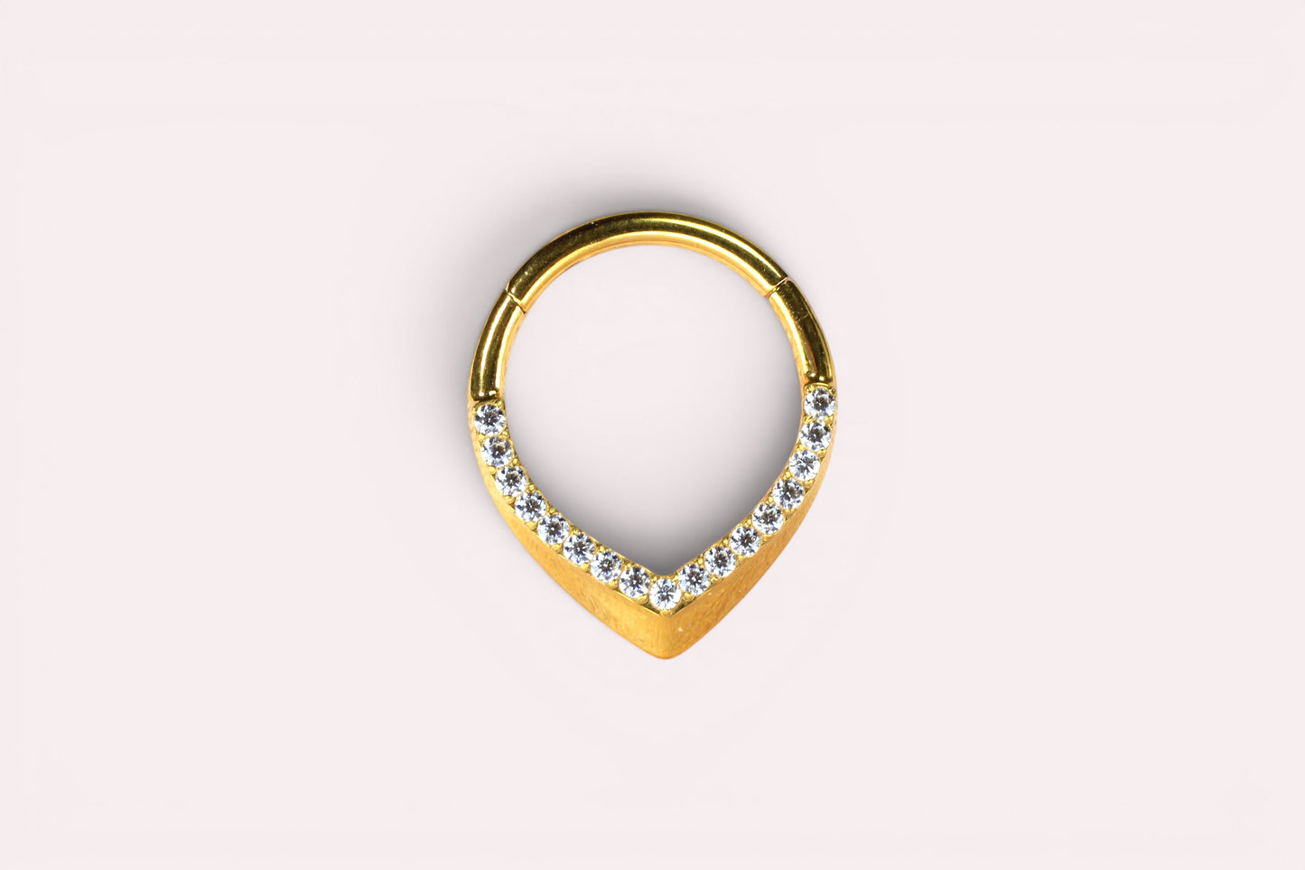 MKBodyJewelry 16g gold titanium septum ring with a V-shaped design adorned with clear CZ stones. Hinged clicker hoop style.