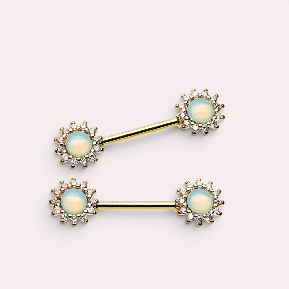 MKBodyJewelry 14g surgical steel nipple barbell set featuring green opal sunburst decorative ends with clear crystals.