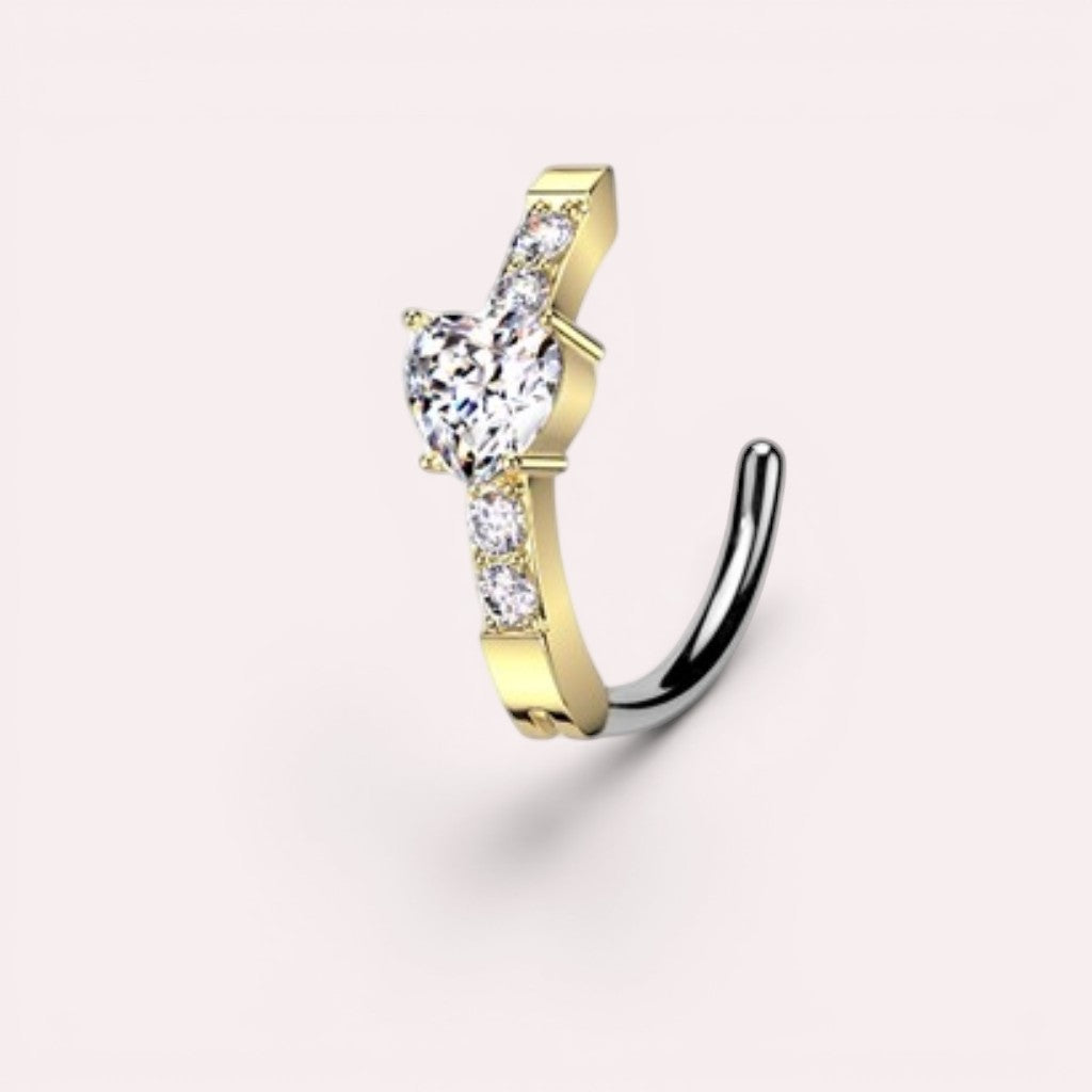 MKBodyJewelry gold and silver heart belly button clicker ring with CZ stones in 14g surgical steel.