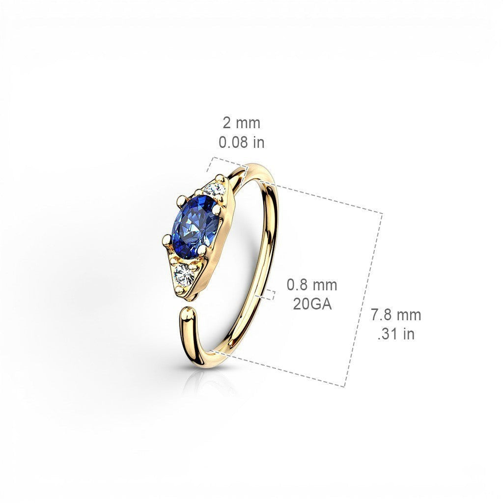 MKBodyJewelry 20g gold nose hoop ring with blue oval gem and clear accent stones. Bendable for nose or cartilage.