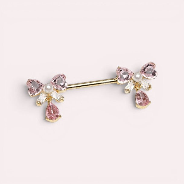 MKBodyJewelry dainty pink ribbon bow nipple ring with dangling teardrop charm. Surgical steel barbell.