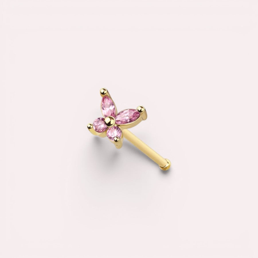 MKBodyJewelry dainty gold nose stud featuring a sparkly pink butterfly gemstone design on a 20g post