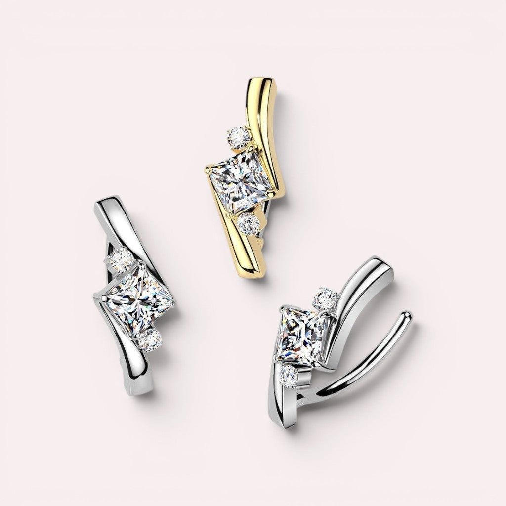 MKBodyJewelry Princess Cut Gemstone Ear Cuff in yellow gold and sterling silver with clear cubic zirconia.