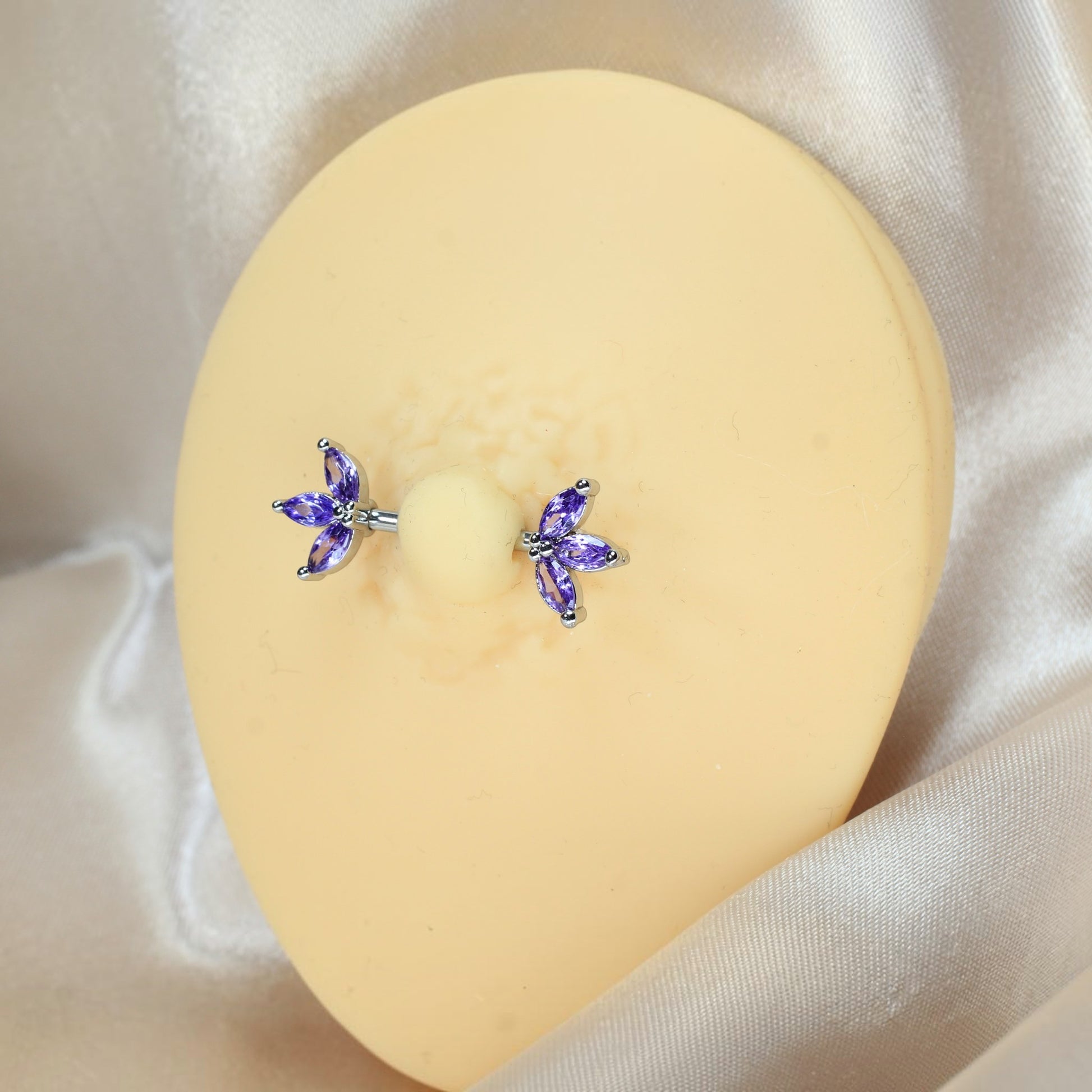 MKBodyJewelry 14G surgical steel nipple barbell pair featuring purple marquise lotus leaf floral gem accents