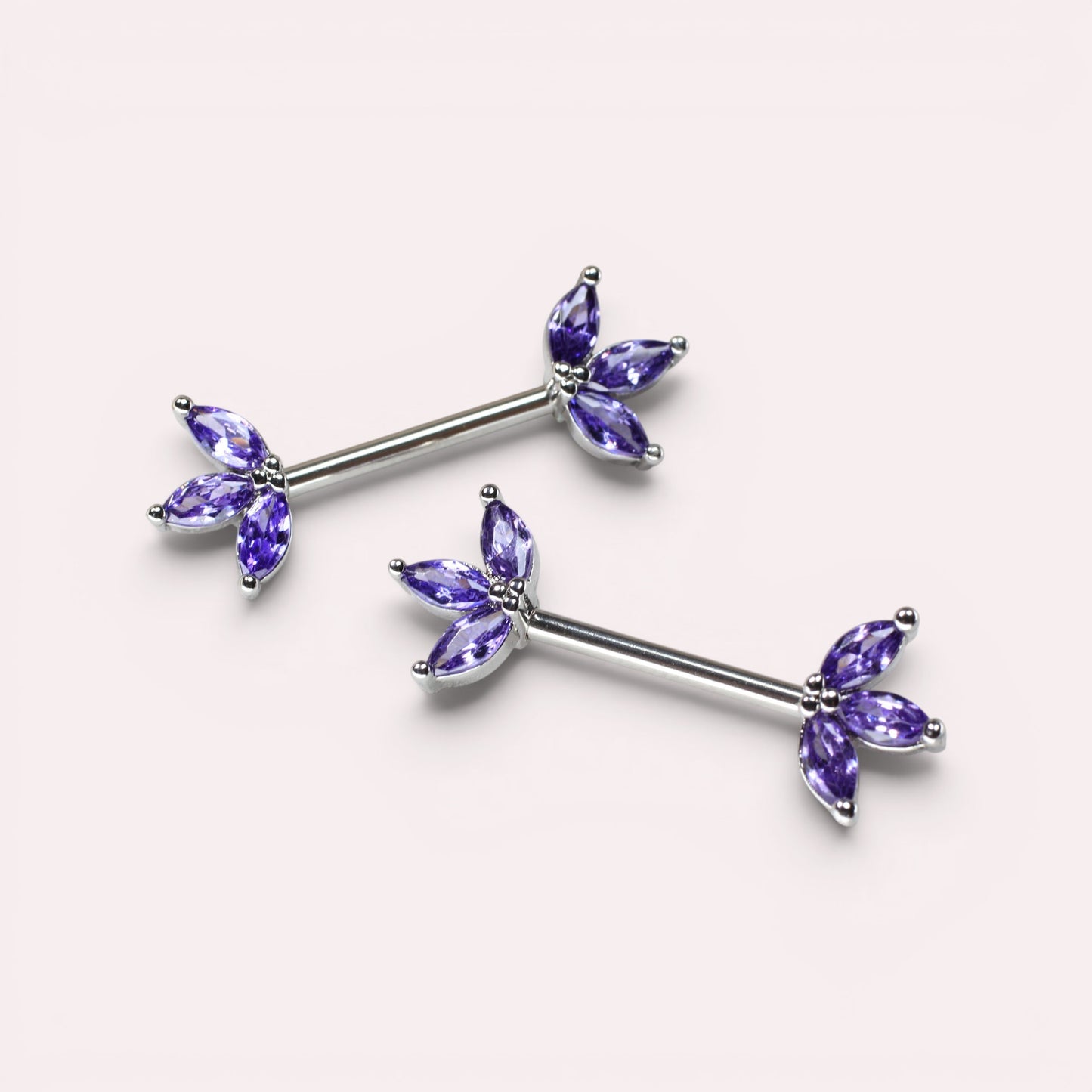 MKBodyJewelry 14G surgical steel nipple barbell pair featuring purple marquise lotus leaf floral gem accents.