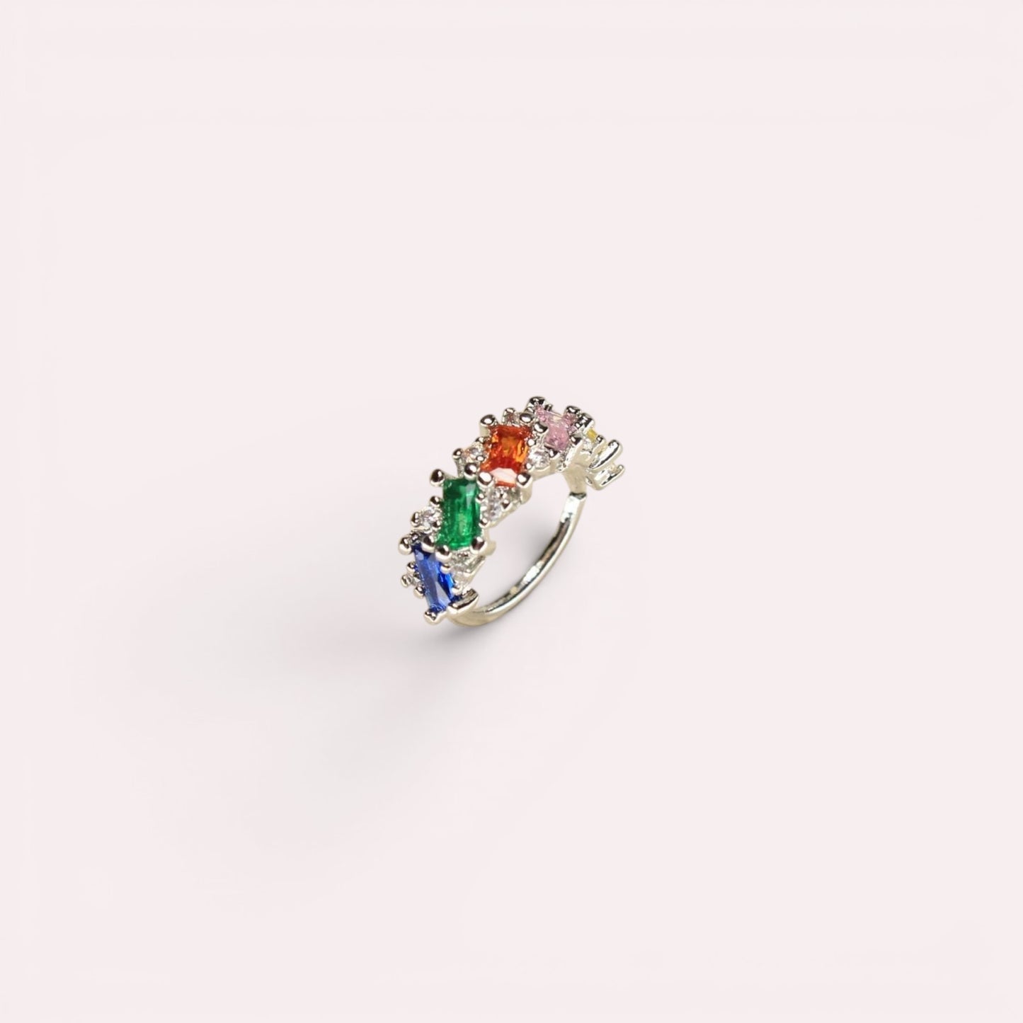 MKBodyJewelry 20g gold nose hoop with rainbow baguette cubic zirconia stones in a delicate surgical steel design.