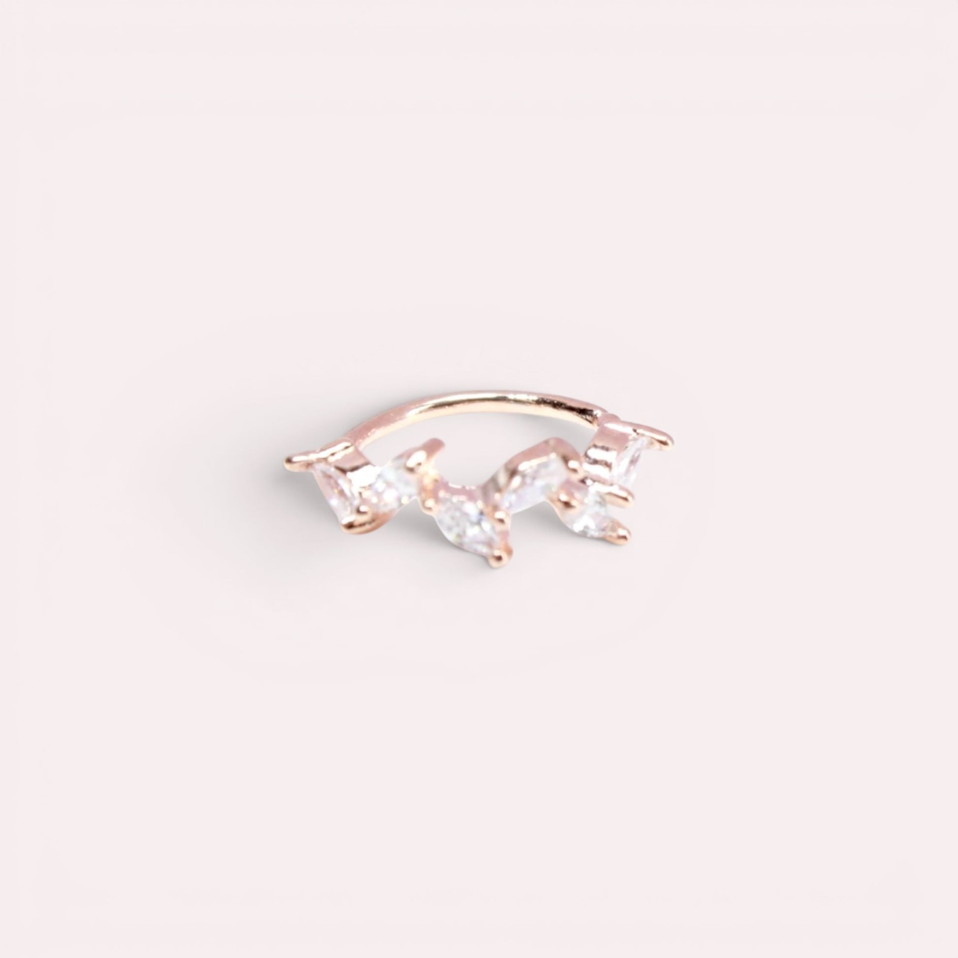 MKBodyJewelry 20g rose gold surgical steel nose hoop with delicate CZ leaf-shaped crystals for cartilage piercings.
