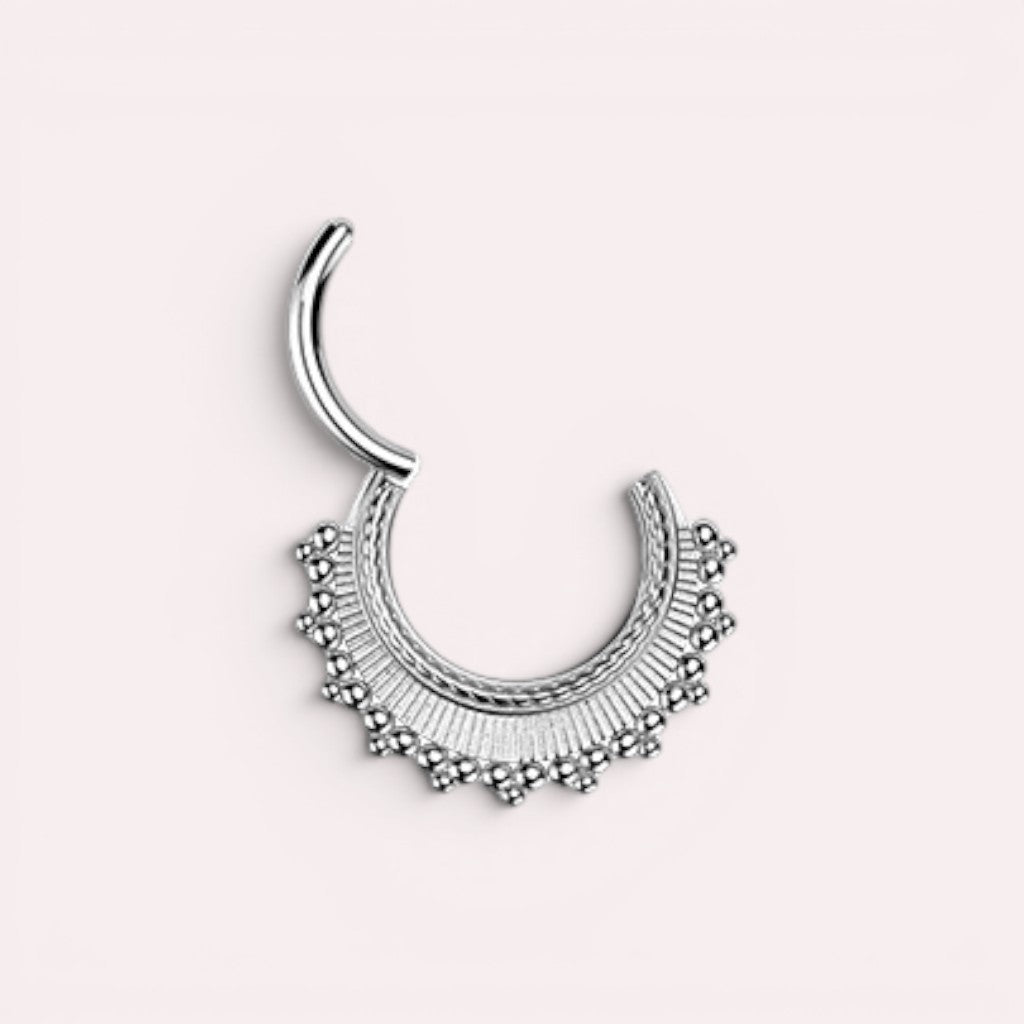 MKBodyJewelry 16g silver beaded tribal style septum clicker ring made of surgical steel. Hinged closure.