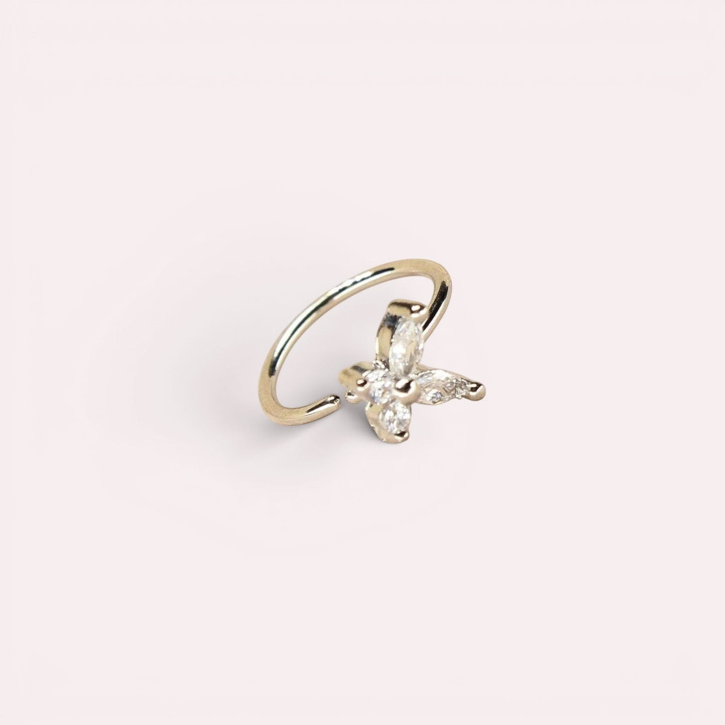 MKBodyJewelry 20g silver surgical steel nose hoop featuring a dainty butterfly charm with clear CZ stones.