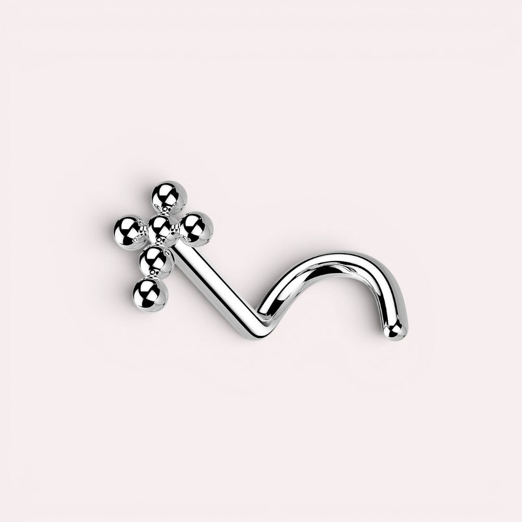 MKBodyJewelry silver beaded cross nose stud made of implant grade titanium with a secure corkscrew S-shape post.
