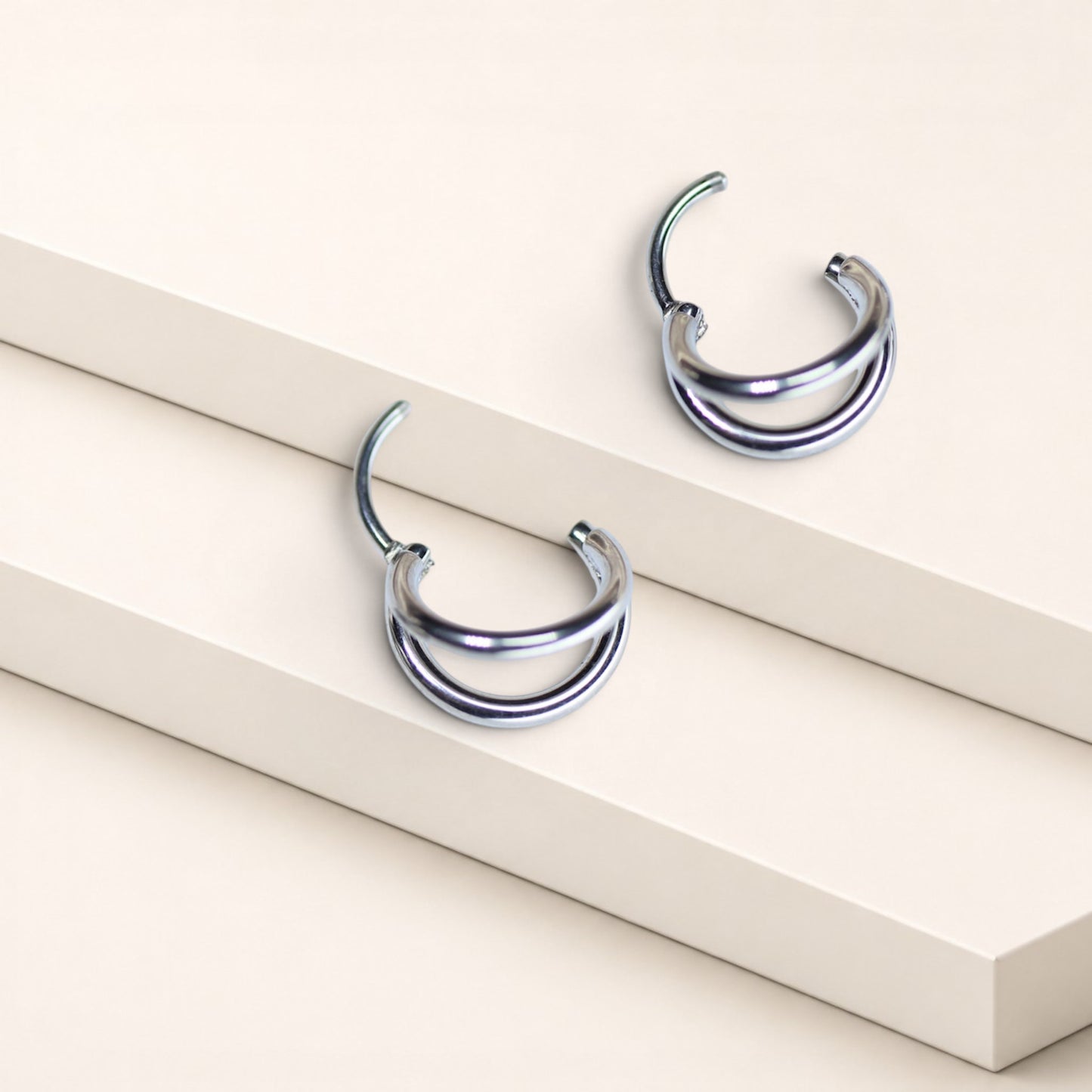 MKBodyJewelry silver double line titanium nose clicker ring with a minimalist snug fit design.