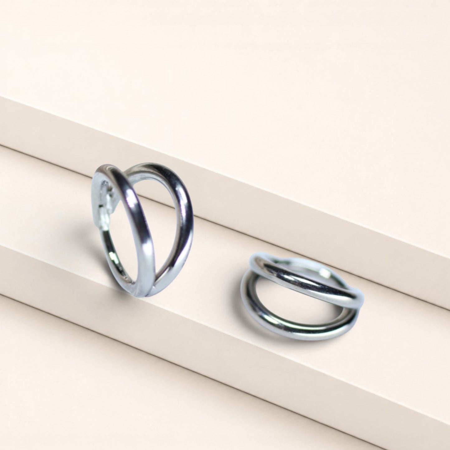 MKBodyJewelry silver double line titanium nose clicker ring, a minimalist hypoallergenic hoop for snug piercings.