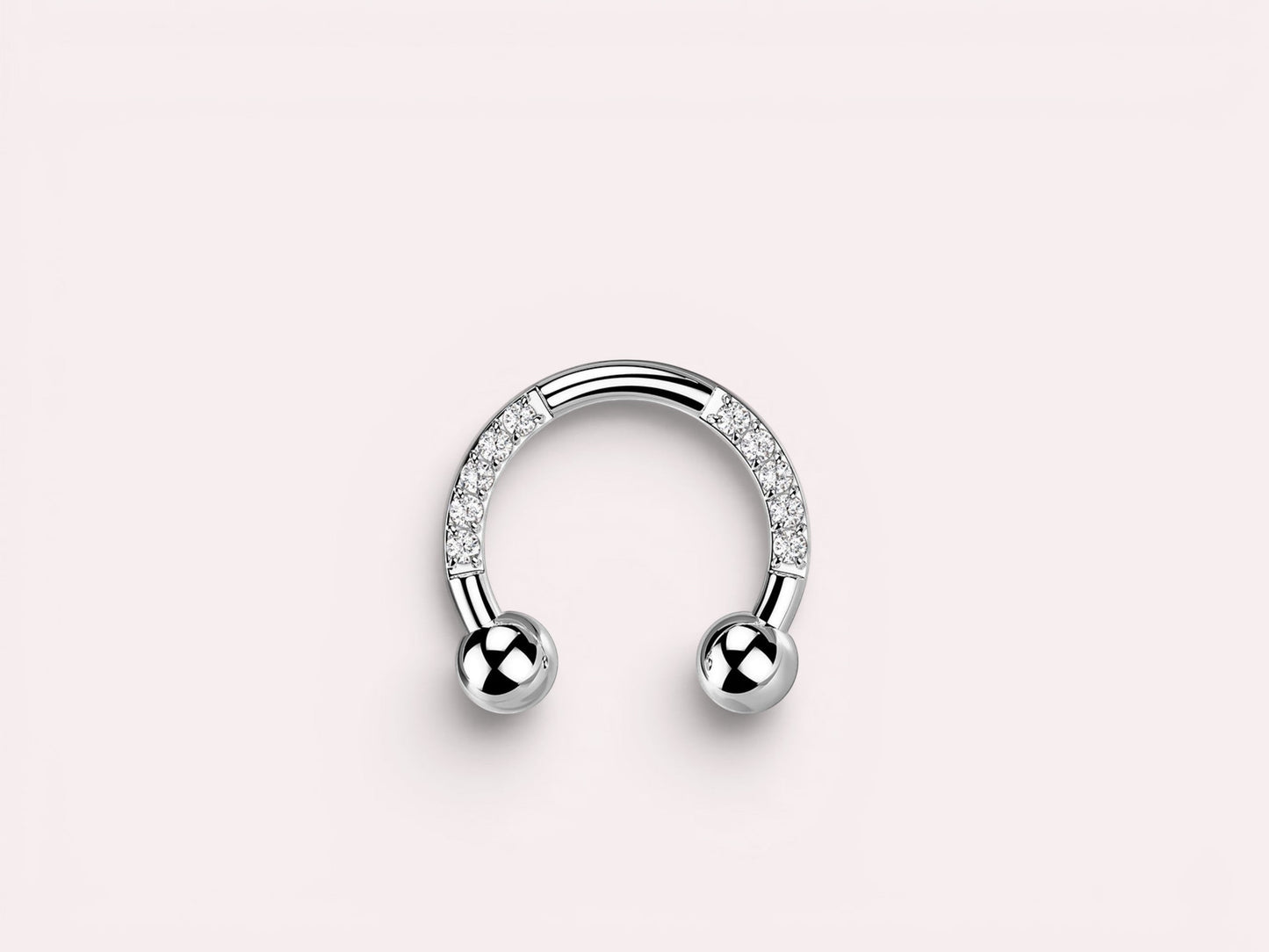 MKBodyJewelry silver horseshoe earring with pave CZ sides and ball ends, made of implant grade titanium.