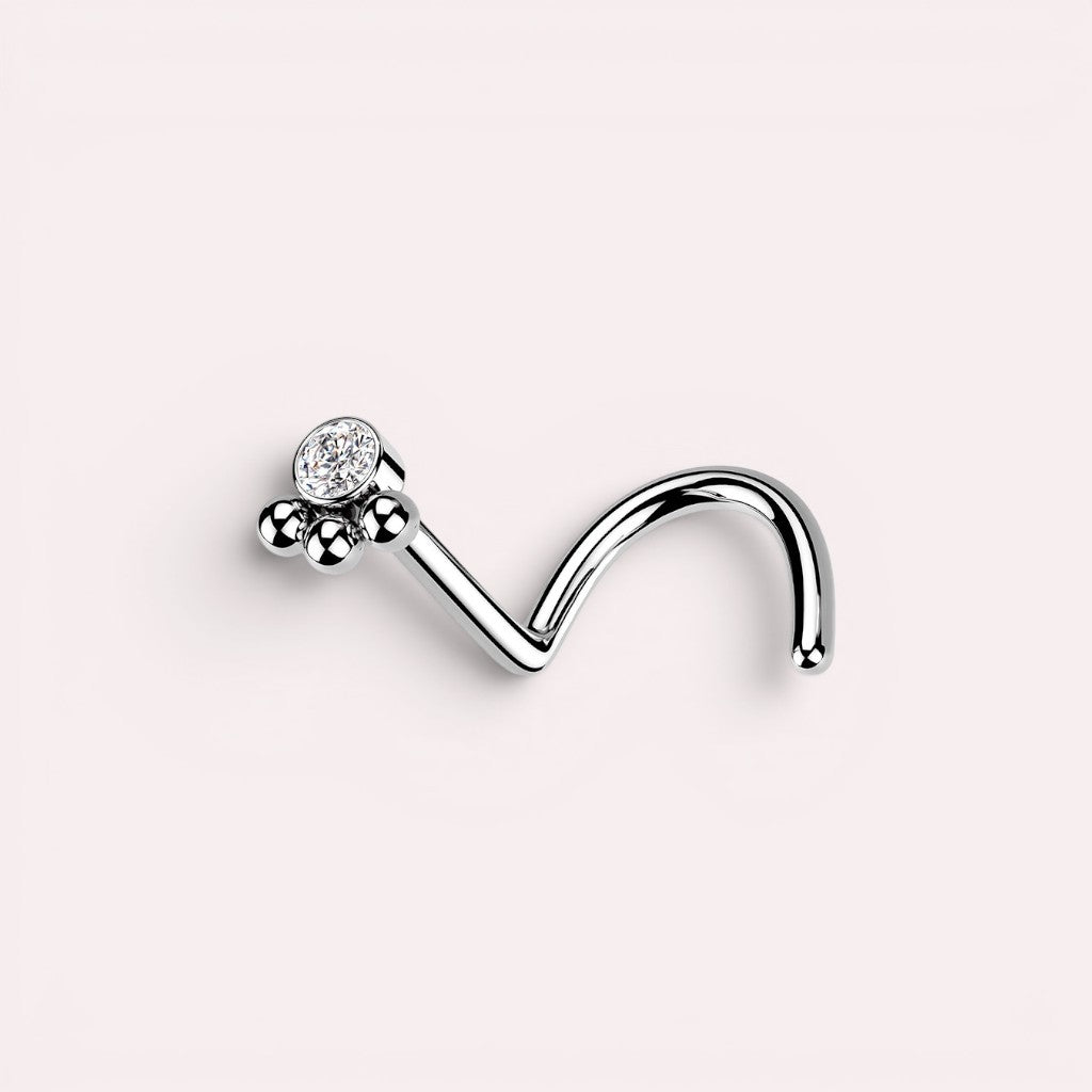 MKBodyJewelry 20G silver stainless steel L-shape nose stud featuring a dainty paw print design with a clear crystal.
