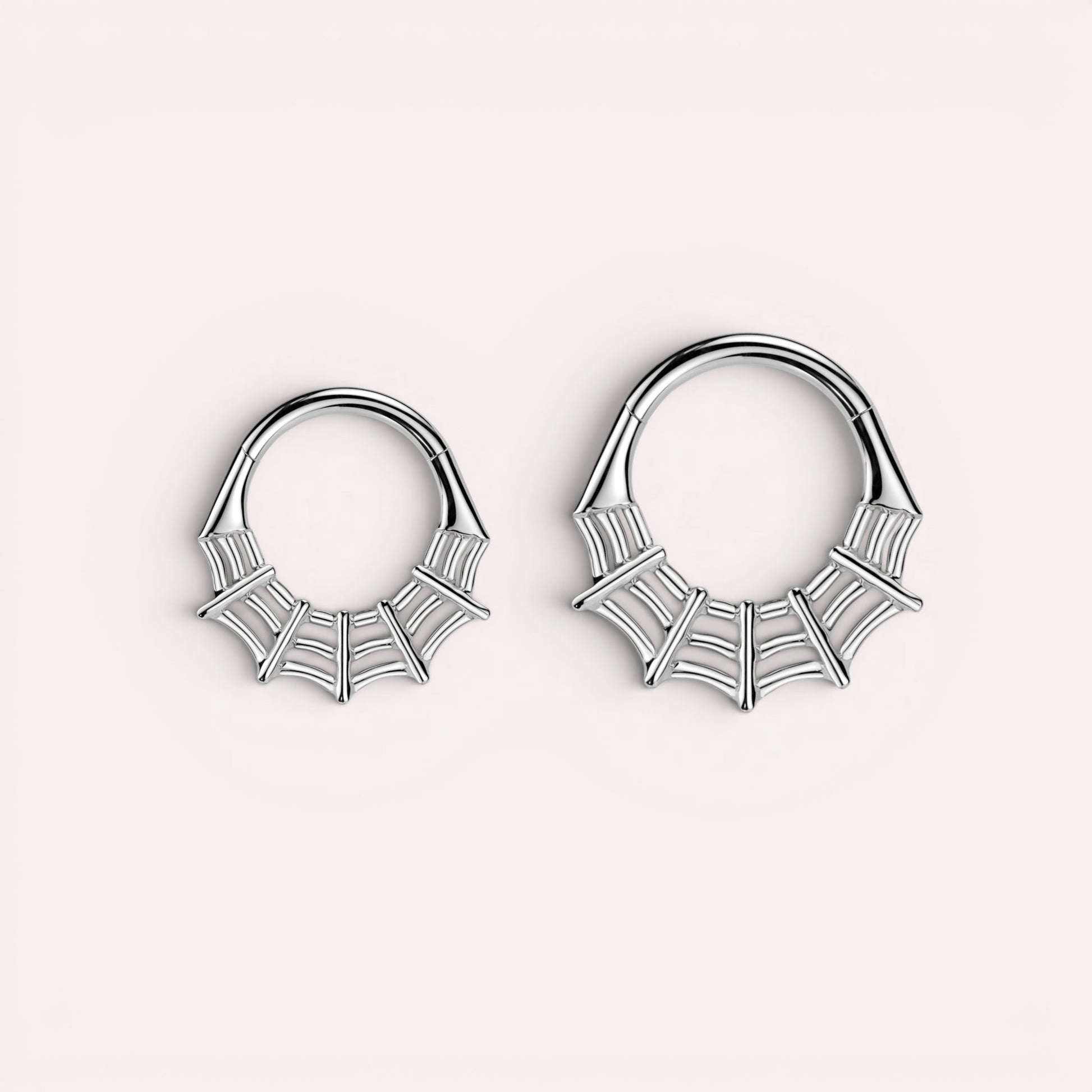 MKBodyJewelry silver surgical steel 16g spider web septum clicker ring, hinged segment hoop.