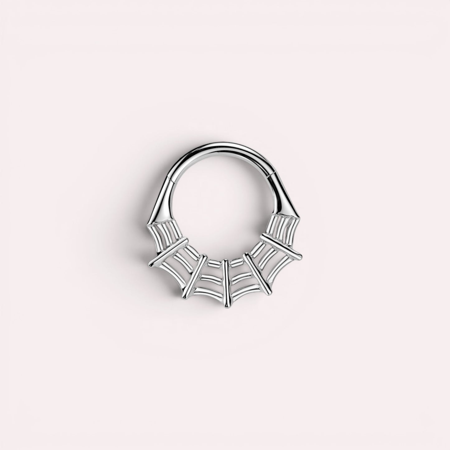 MKBodyJewelry silver surgical steel 16g spider web septum clicker ring with hinged segment hoop design.